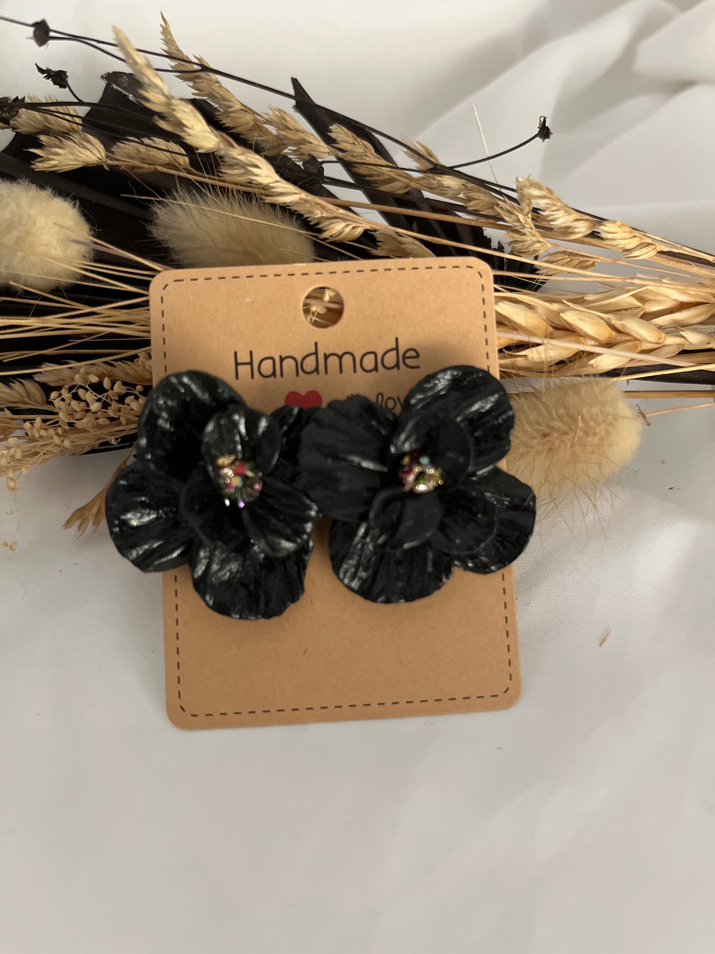 Puce d’oreille fleur noir